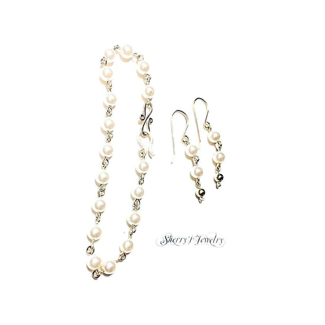 14kt Gold pearl earring and bracelet set