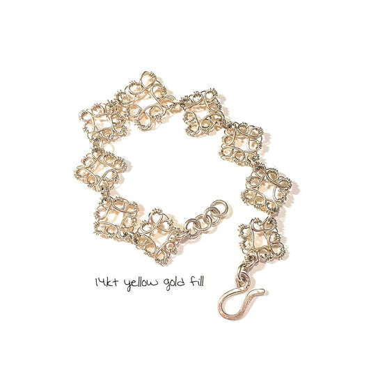 14kt Gold Filigree Flower link bracelet