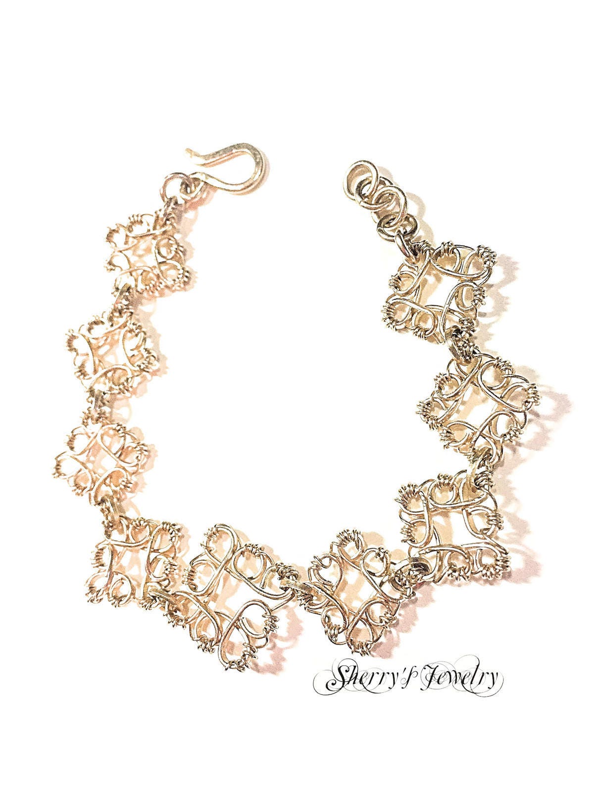 14kt Gold Filigree Flower link bracelet