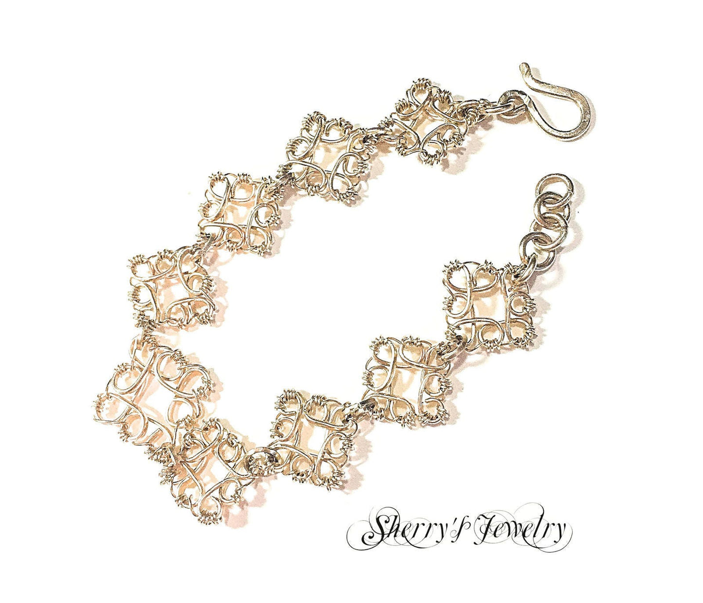 14kt Gold Filigree Flower link bracelet
