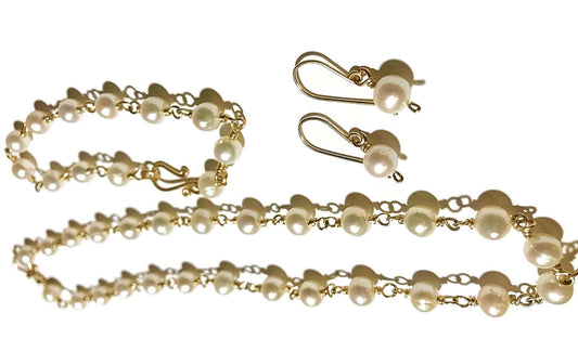 14kt Gold Pearl necklace, bracelet, and earring set